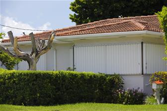 Florida HIP roof and hurricane shutters